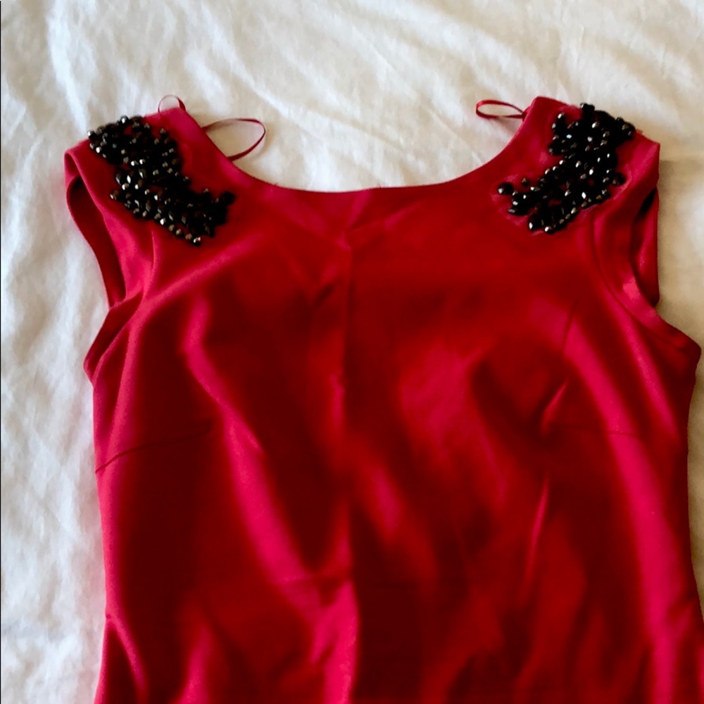 Backless dress with gems on the shoulders